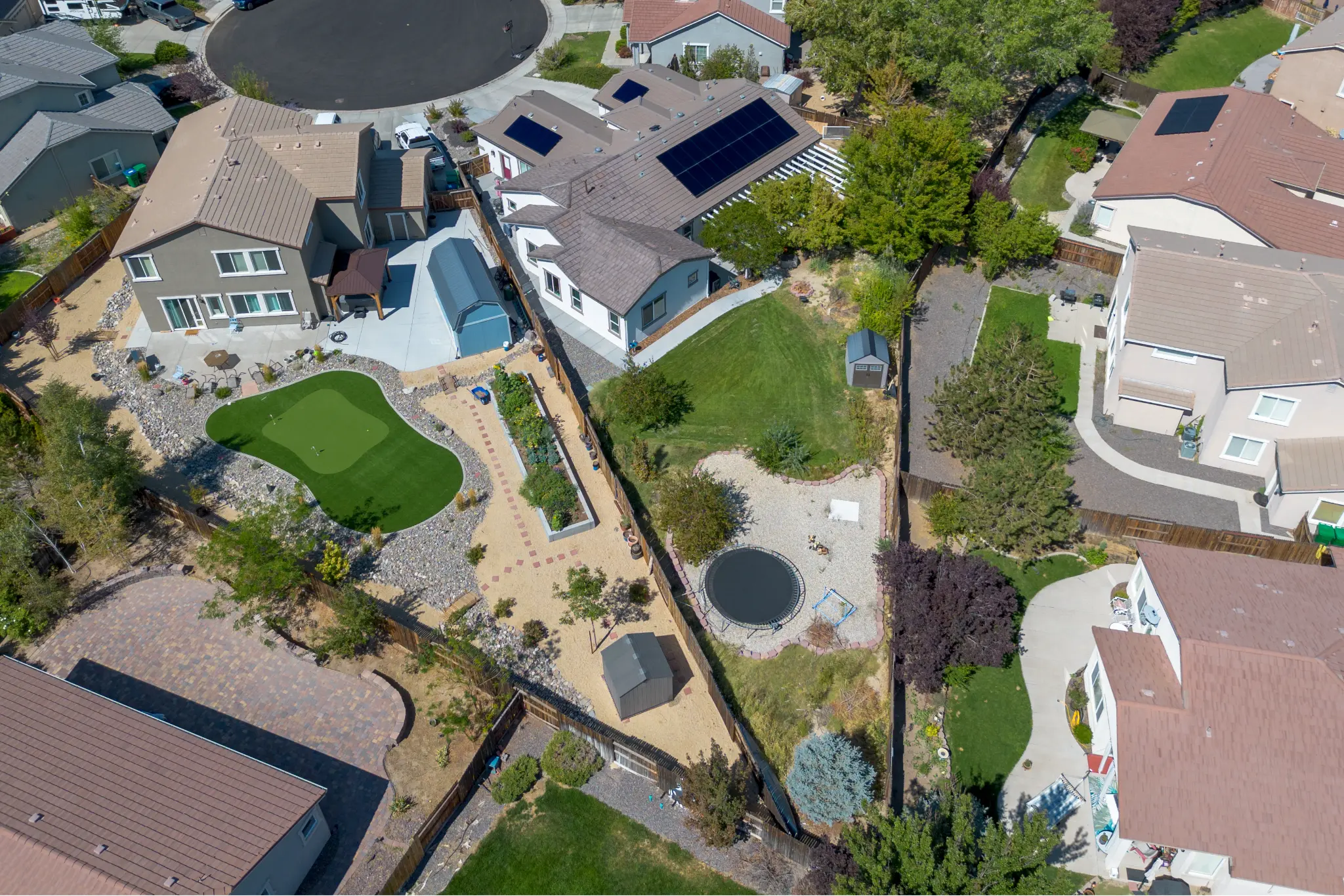 Side yard and fence of Seven Pines Court luxury home in Damonte Ranch Reno NV 89521